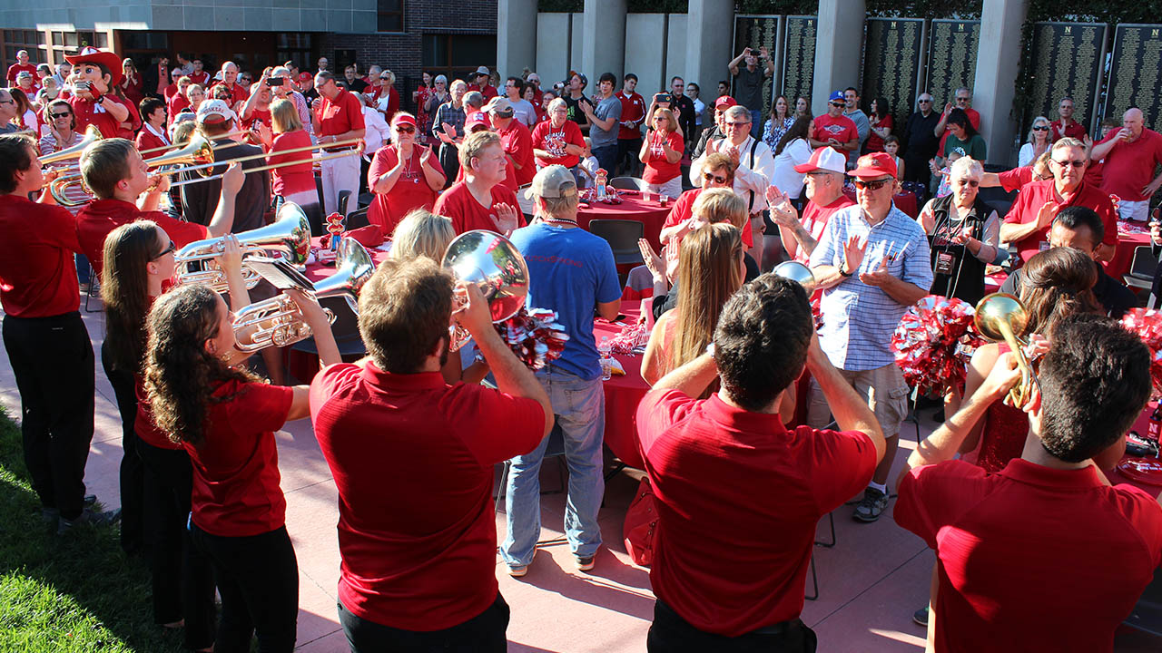 The Husker pep band plays during a 2016 Football Fridays event at the Wick Alumni Center's Holling Garden.