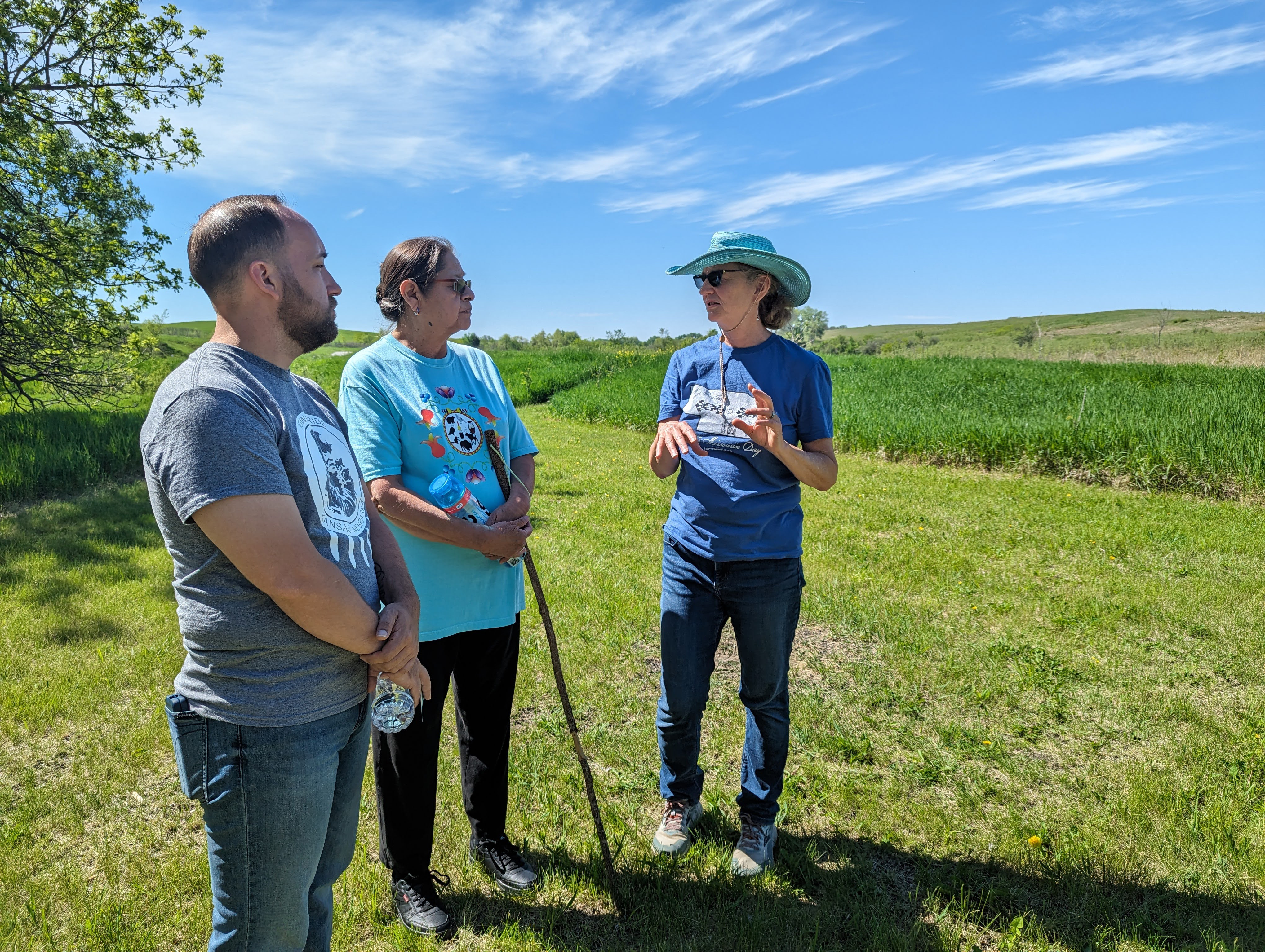 Margaret Jacobs (right), Charles Mach Professor of history, director of the Center for Great Plains Studies and co-director of the Walking in the Footsteps of Our Ancestors project, speaks with project team members Cory DeRoin and Billie Tohee (both Otoe-Missouria) at Spring Creek Prairie Audubon Center near Denton.
