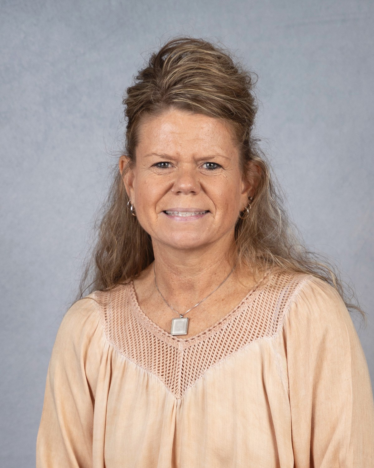 Color portrait of Terri Hogue, math teacher at Falls City Middle School.