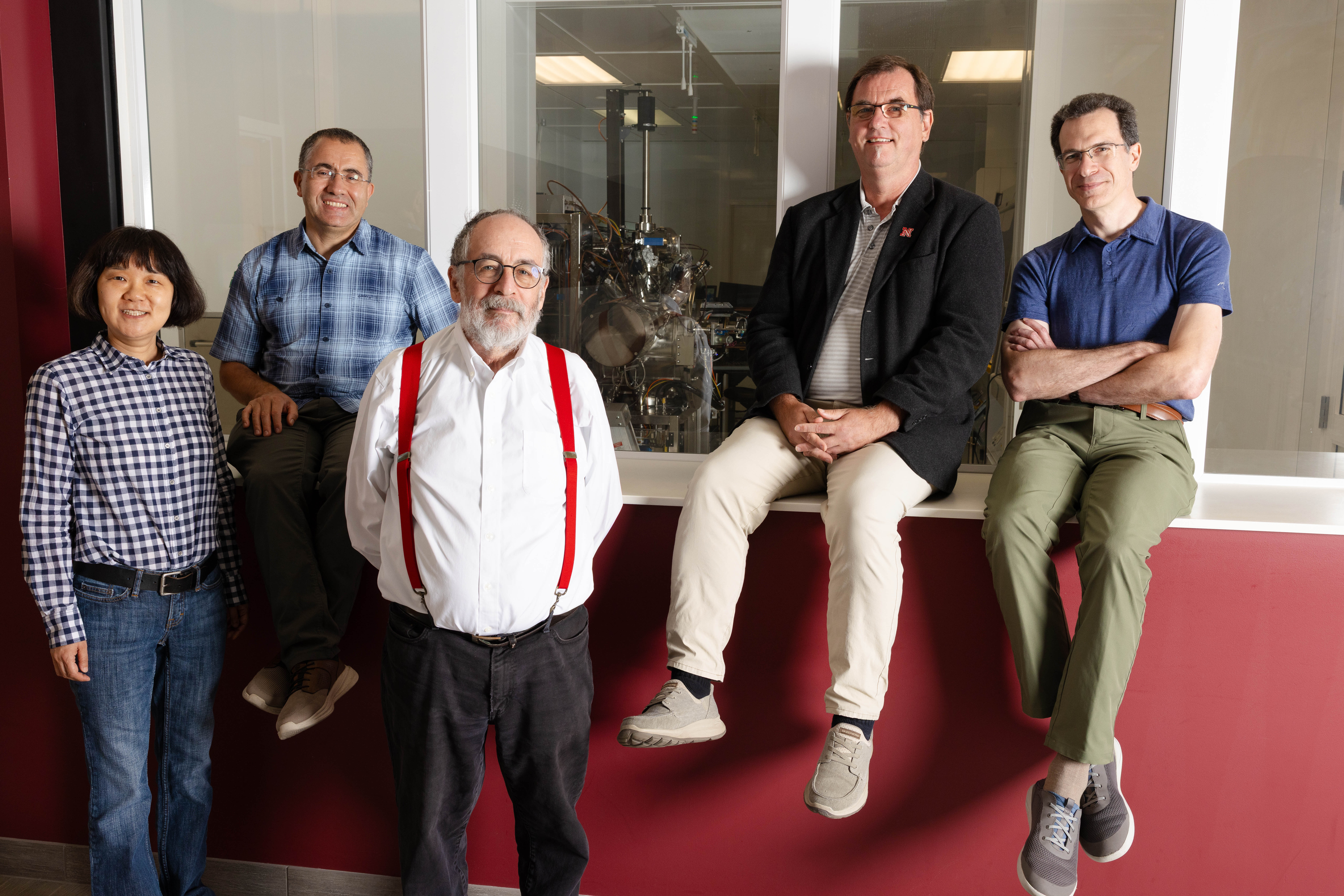 Christian Binek (second from right) is principal investigator of a new National Science Foundation-funded program exploring novel two-dimensional materials. Team members on the project are (from left) Xia Hong, professor of physics and astronomy; Abdelghani Laraoui, associate professor of mechanical and materials engineering; Peter Dowben, Charles Bessey Professor of physics and astronomy; and Kirill Belashchenko, professor of physics and astronomy.