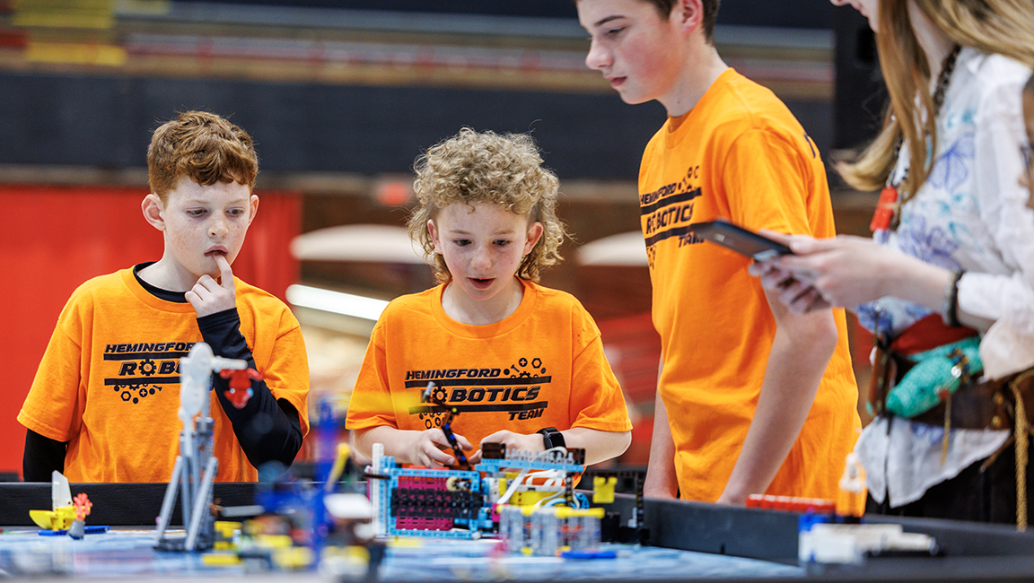 Members from the “Hemingford Robotics” group watch their robot compete during their practice round at the 4-H Robotics Expansion Event. March 21, 2025.