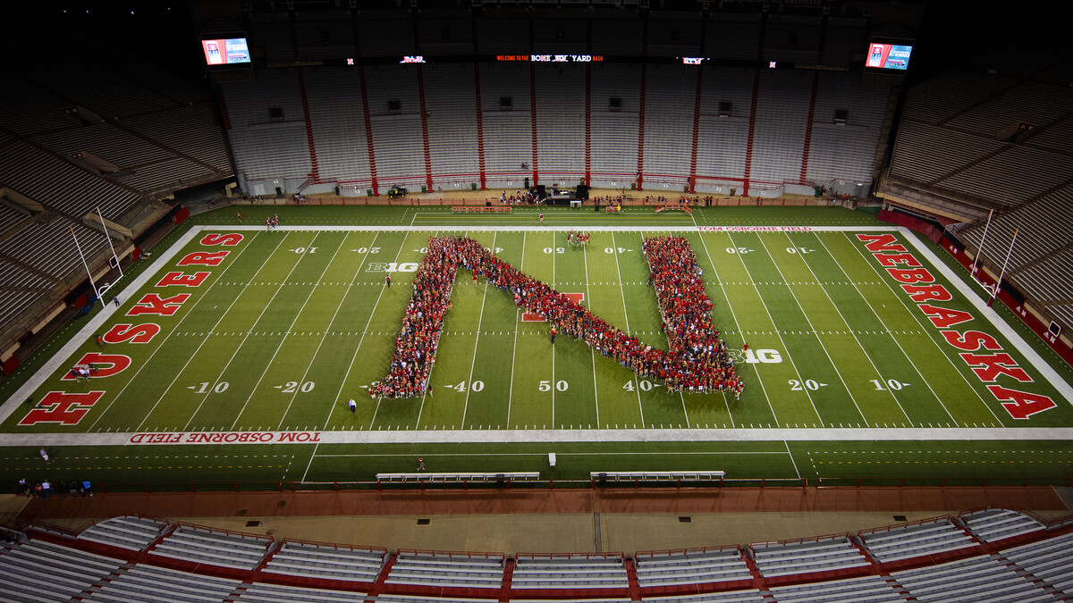 Members of the University of Nebraska–Lincoln's freshman class line up in the shape of an "N" during the New Student Tunnel Walk on Aug. 27. For the second year, enrollment at the university has surged to an all-time high.
