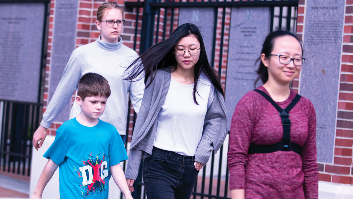 A participant takes an outdoor walk with researchers.