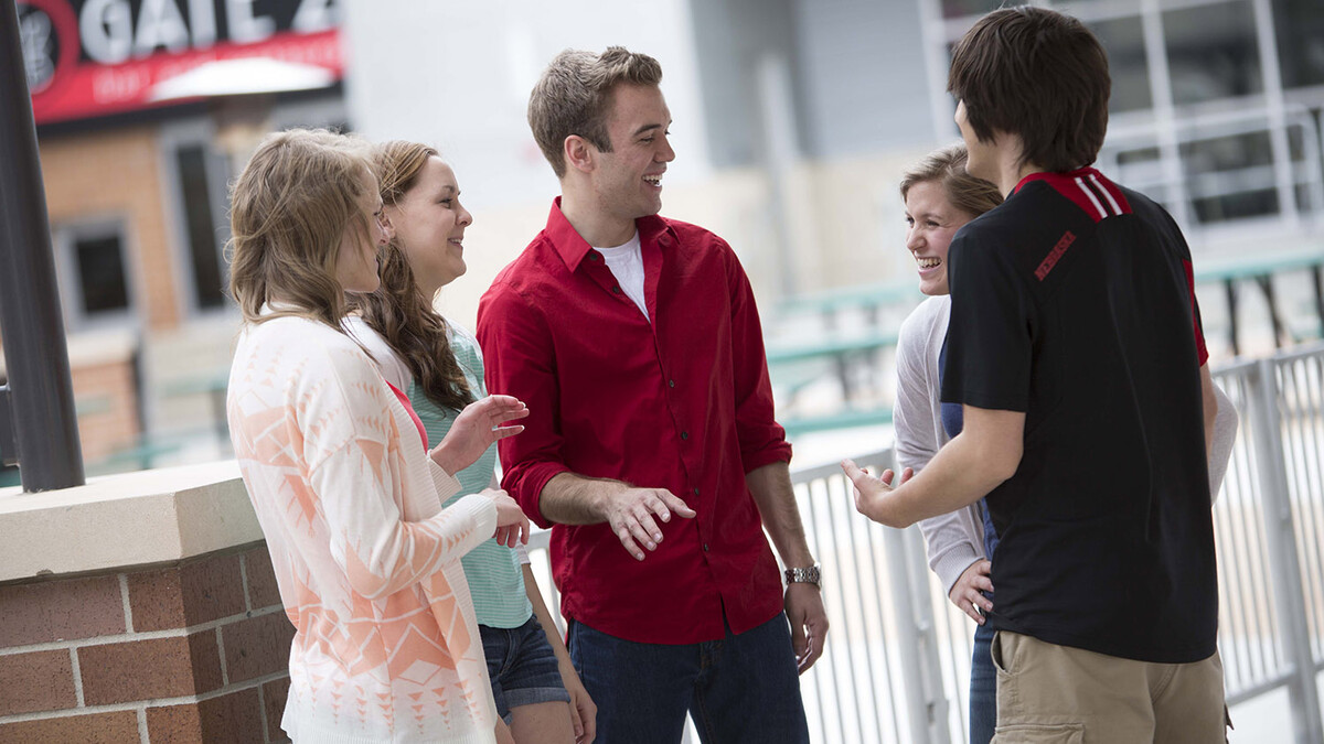 CBA Honors Academy students converse in Lincoln's Railyard entertainment district. Forty-three recent high school graduates have been selected to join the academy in the fall.