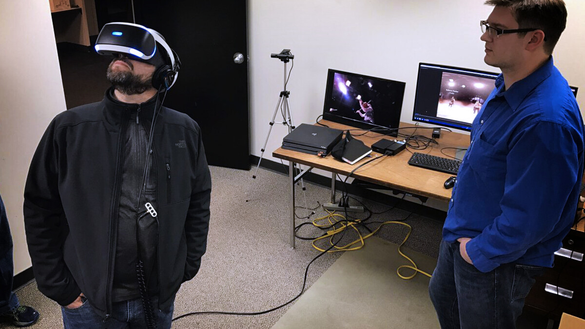  Adam Wagler, assistant professor of advertising, reviews 360-degree video with David Koehn, NET producer, as part of the collaboration to continue work in virtual reality research.