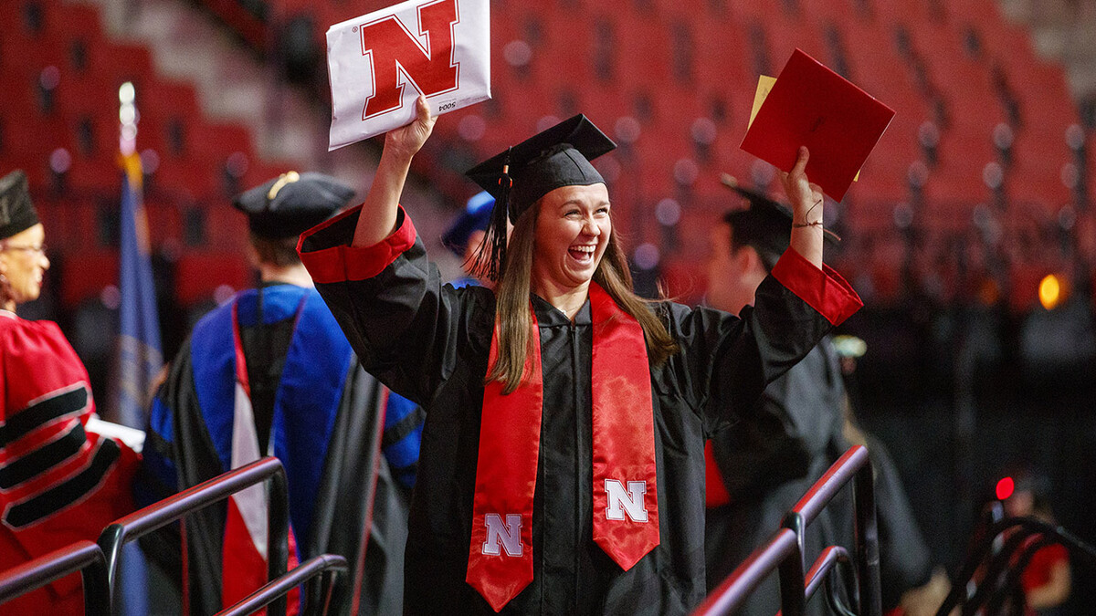 Nicole Colonna celebrates after receiving her degree during the summer commencement ceremony Aug. 17 at Pinnacle Bank Arena. She earned a Bachelor of Science in Education and Human Sciences. 