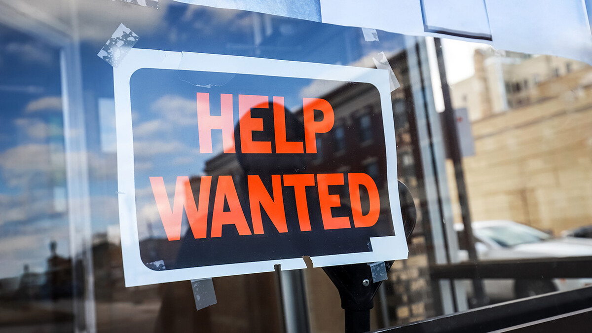 Help wanted sign in window