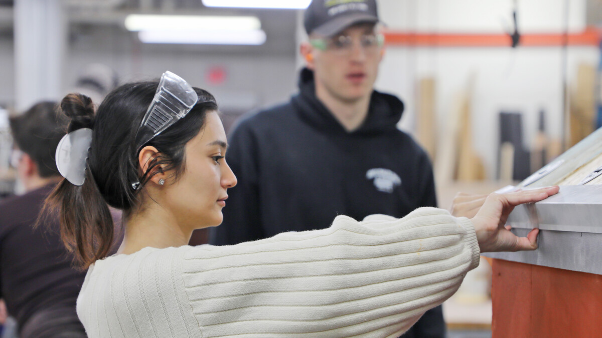 Paulina Garcia-Medrano, Master of Architecture student and member of the FACT studio, works on prefabricated components for the OurStory project at Nebraska Innovation Studio in Lincoln.