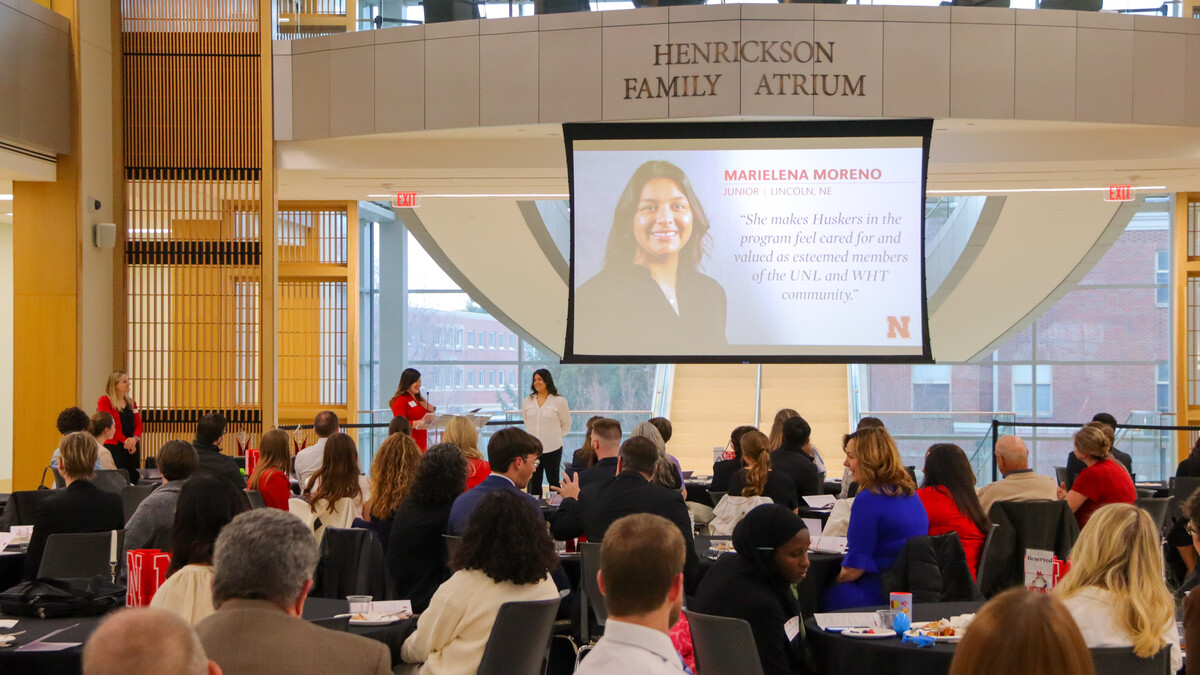 2022 Student Luminary recipient Marielena Moreno accepts her award during the reception in Hawks Hall.