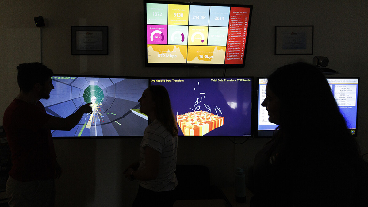 Students interact in a computer lab.