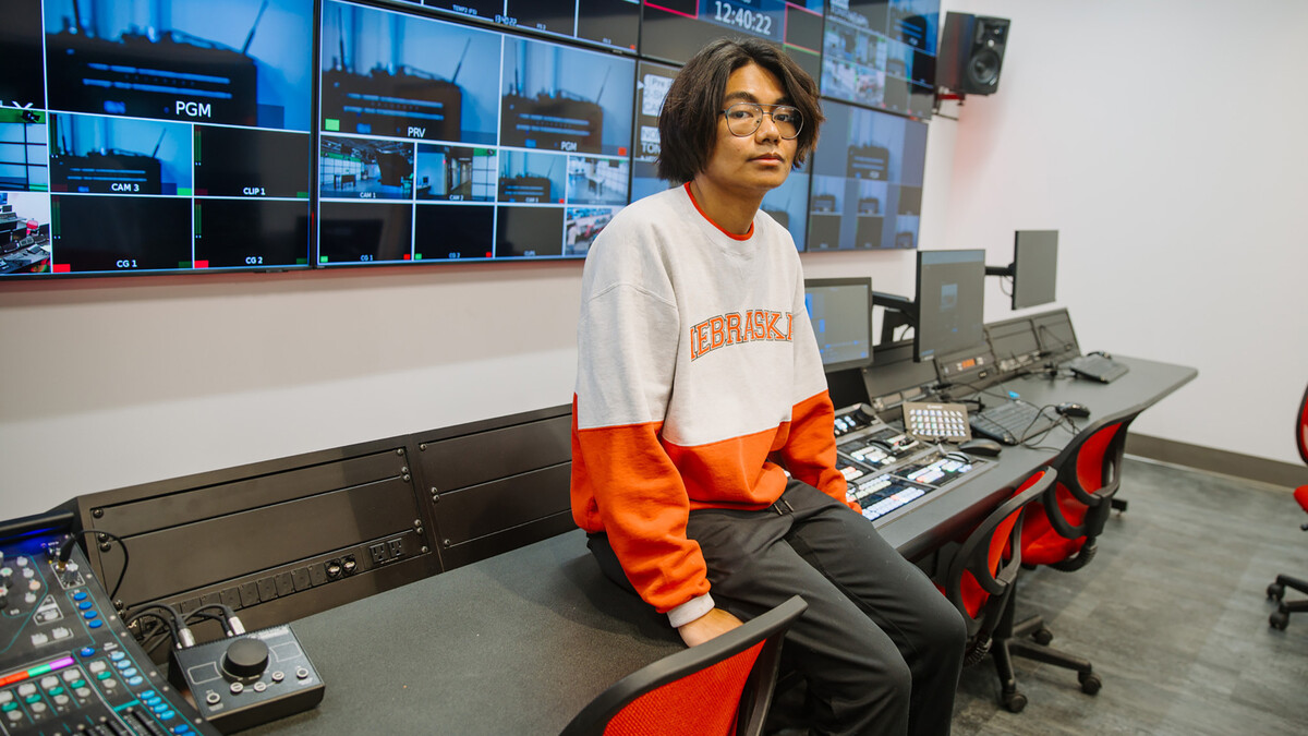 Jay Quemado is photographed in the broadcasting studio.