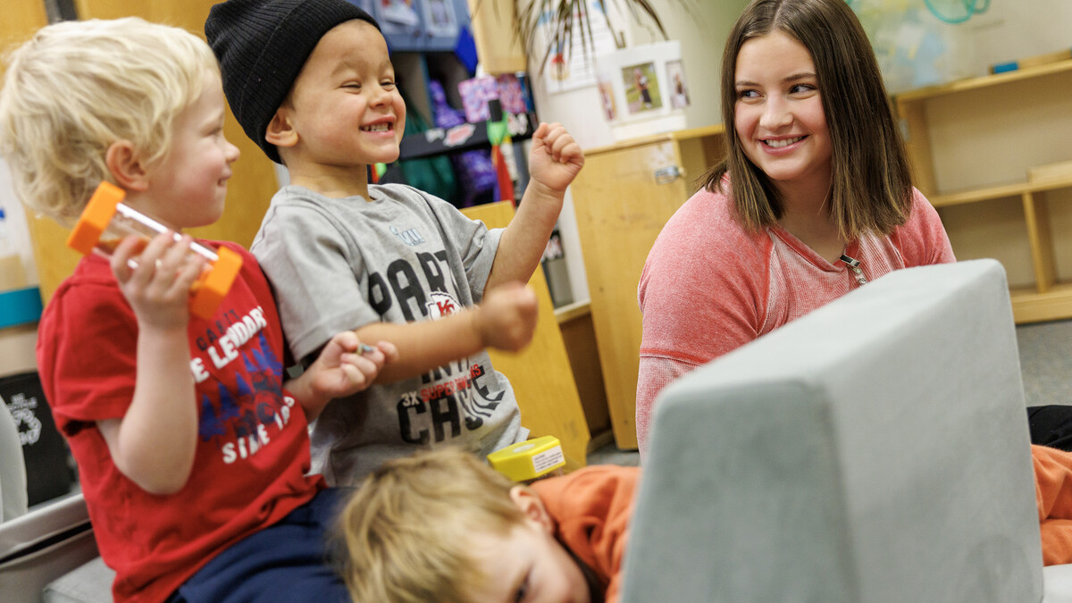 Lilly Jonas, sophomore Elementary Education & Early Child Education major, plays with children during their Student Teaching in Early Childhood Education: Preschool course inside the Ruth Staples Child Development Lab. 