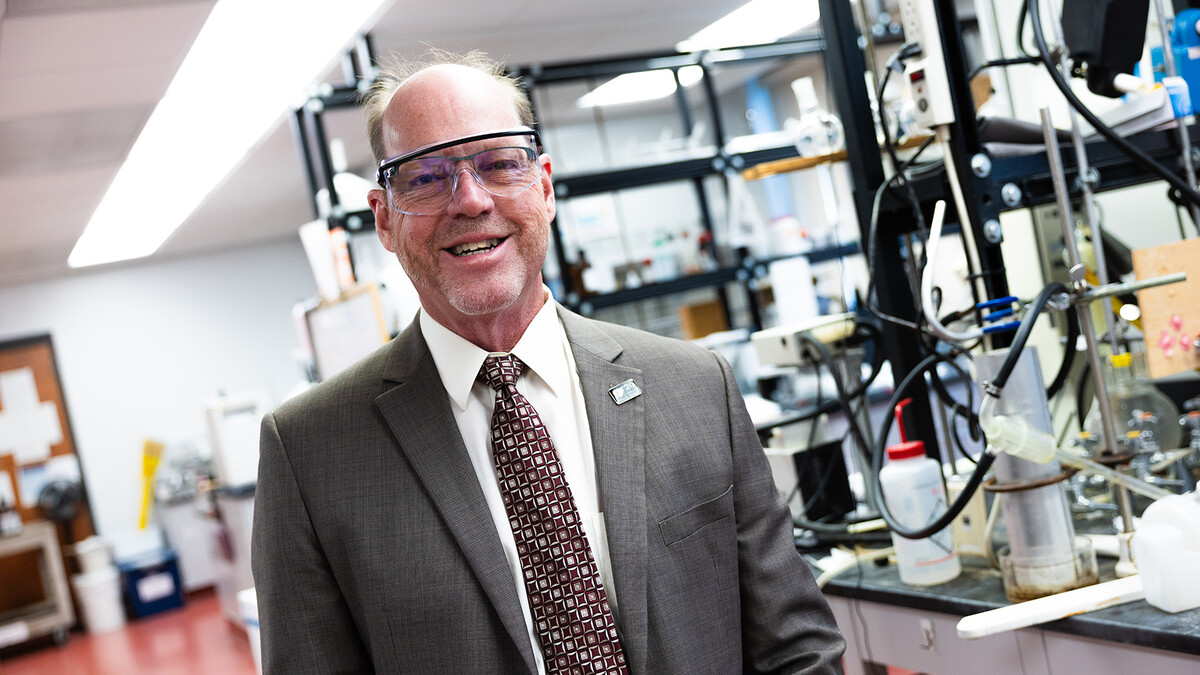Pat Dussault stands in his Hamilton Hall chemistry lab.