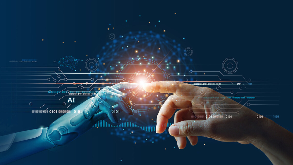 A robot hand touches the pointer finger tip of a human hand with its own pointer finger.