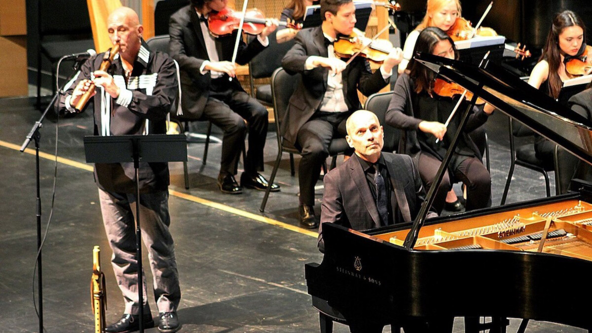 Paul Barnes (right) performs with Ron Warren.