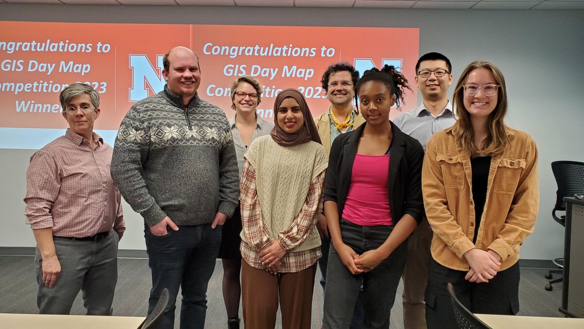 Winners of the GIS Map Competition come together with the judges of the competition to receive their awards. 