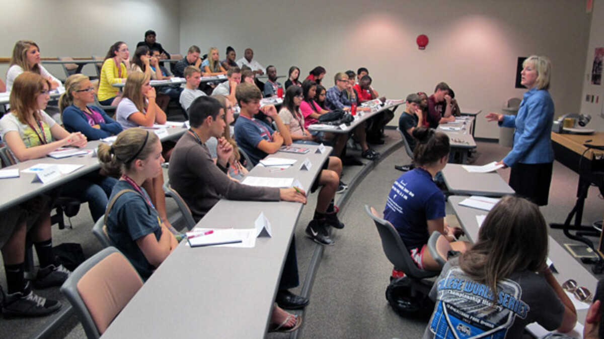 Donde Plowman talks to high school seniors in the Dream Big Academy.