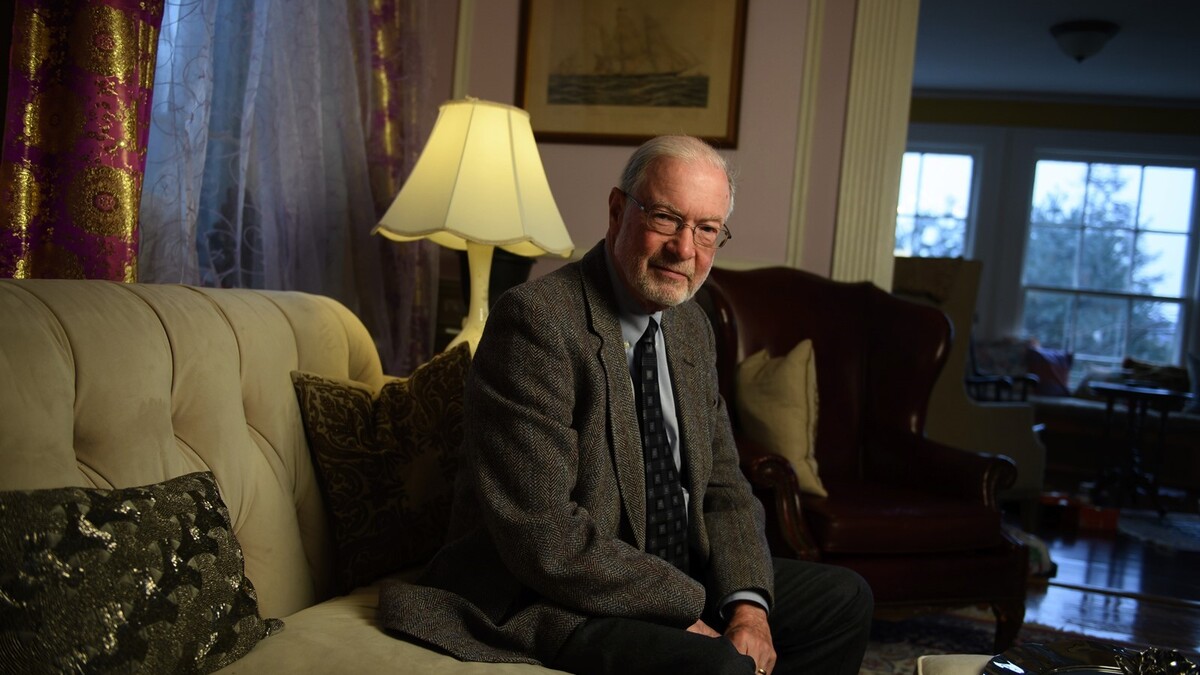 John Roy Price is pictured in his home.