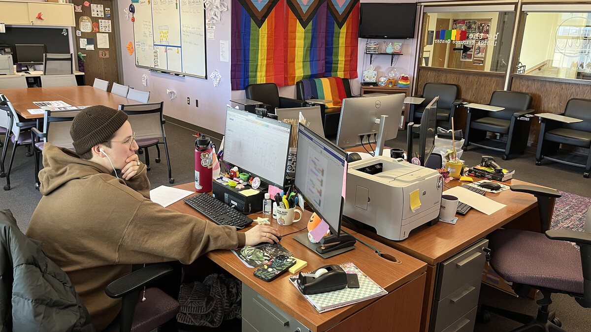 Ash Turner, graduate assistant, works in the LGBTQA+ Center Jan. 31, 2023.