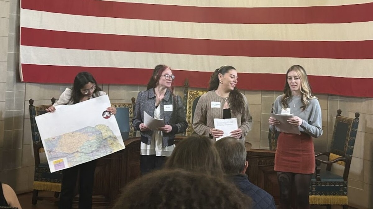 Jiromi Corona, Jeni Fry, Jacey Deplanty, and Dez Fisher, Statewide Youth Action Board on Homelessness members and Nebraska Appleseed Child Welfare Youth Fellow, present at the Nebraska State Capitol