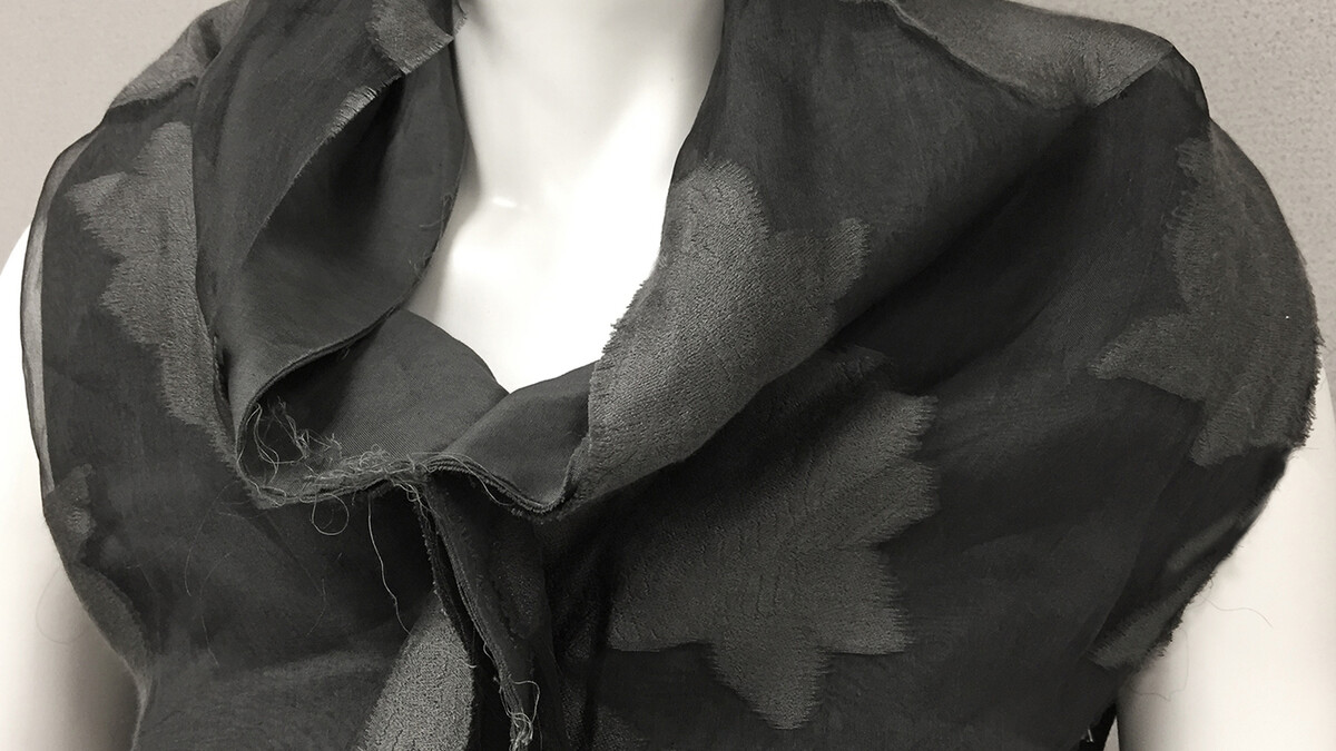 Gray deconstructed cowl neck dress, c. 2000 Label: Comme des Garcons, Designer: Rei Kawakubo.  Departmental purchase from the estate of Mary Wangsness of Minneapolis, Minnesota, 2011.001.035