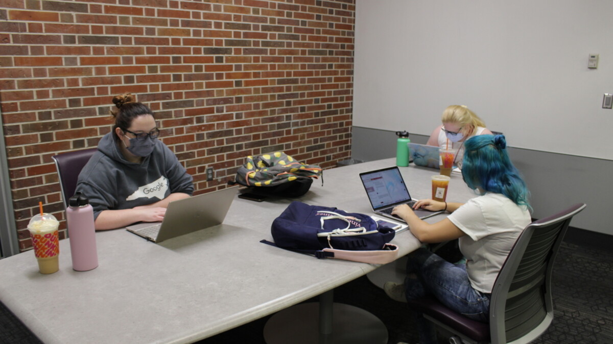 Students studying in the Adele Hall Learning Commons