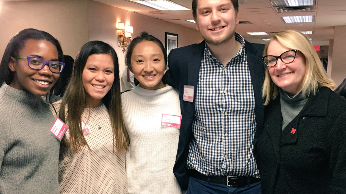 Wellesley Michael, Anna Fobair, Julia Nguyen, Carlos Velasco and Amy Sturthers pose during the multicultural scholars conference in New York City.