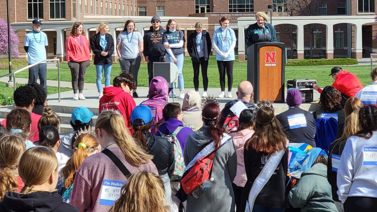 Speakers and members of Out of the Darkness gather at the RSO's Suicide Prevention Walk in 2024.