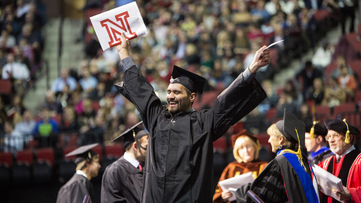 James Aguero of Houston celebrates his College of Business Administration degree.