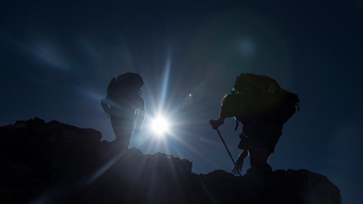 Mike Forsberg and Peter Stegen reach the summit of Grays Peak in Colorado. The duo is featured in the NET Television-produced documentary, "Follow the Water."