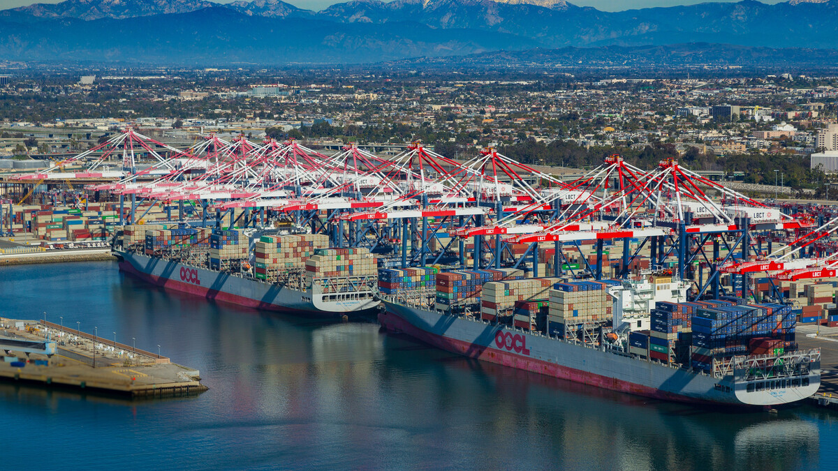 Port terminal is shown receiving cargo ships