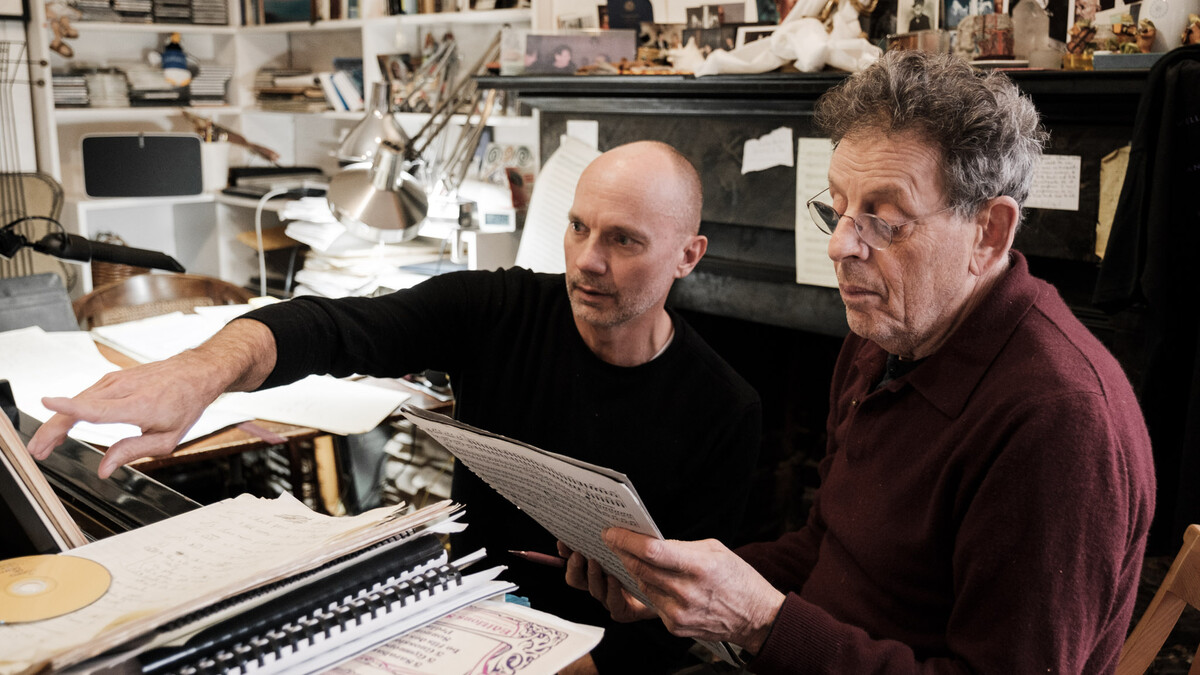 Paul Barnes (left) and Philip Glass review the score for "Annunciation."