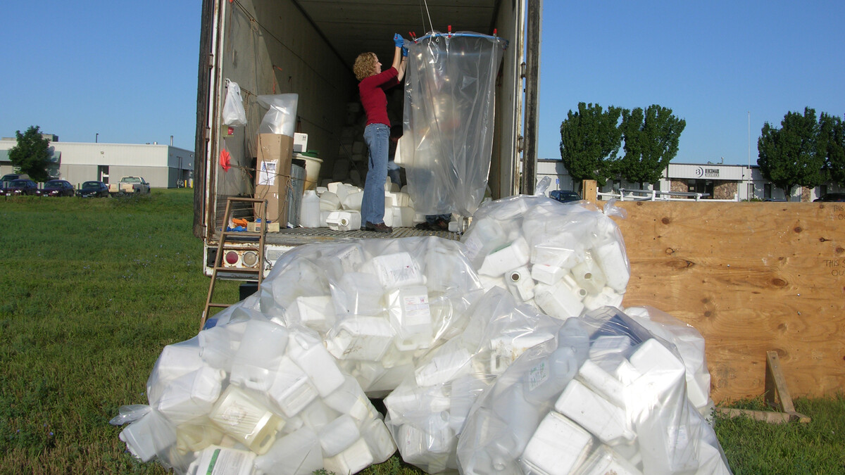 Leah Sandall, a lecturer in agronomy and horticulture, works at a UNL Extension pesticide container recycling site. The program, which has recycled more than 1,000 tons of the containers, is in its 23rd year.