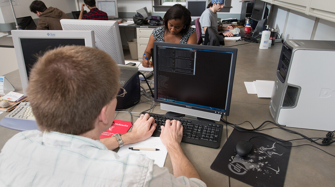 Students work on computers in UNL’s Schorr Center. Information and Technology Services has launched a $1.5 million upgrade of the campus computing network. When complete, the project will double bandwidth available to campus buildings and high-demand locations.