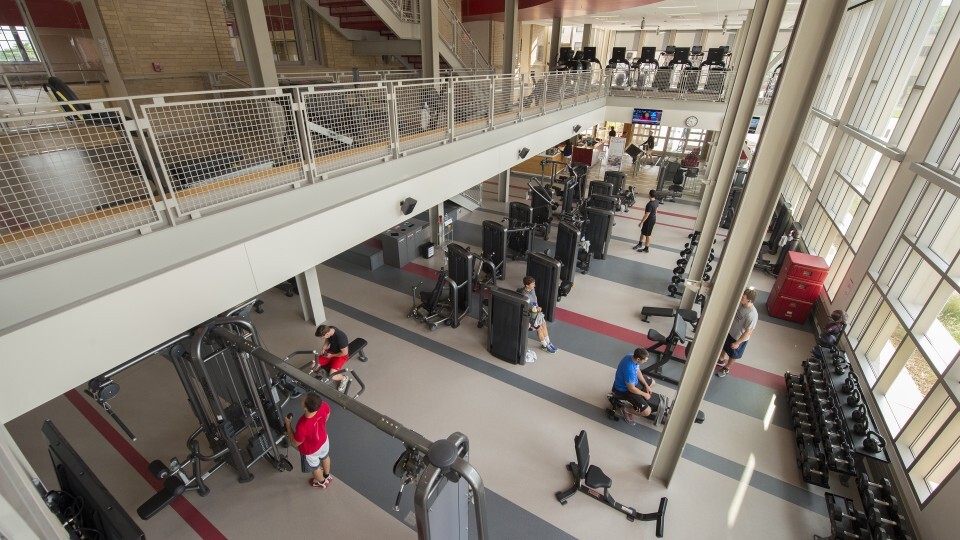 Members of the campus community work out in the Recreation and Wellness Center on East Campus. The facility is home to the university's wellness initiative. | Craig Chandler, University Communication 