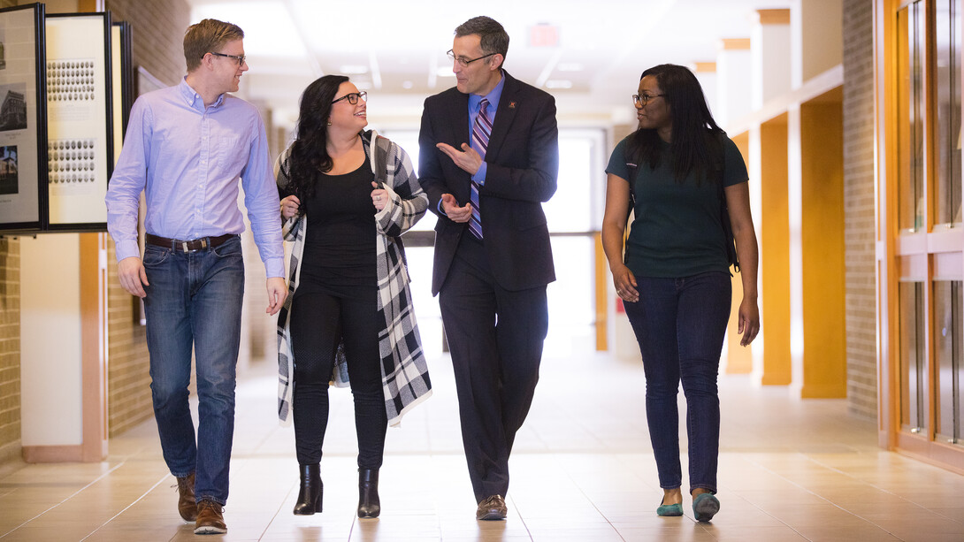 Richard Moberly talks with students in the College of Law.