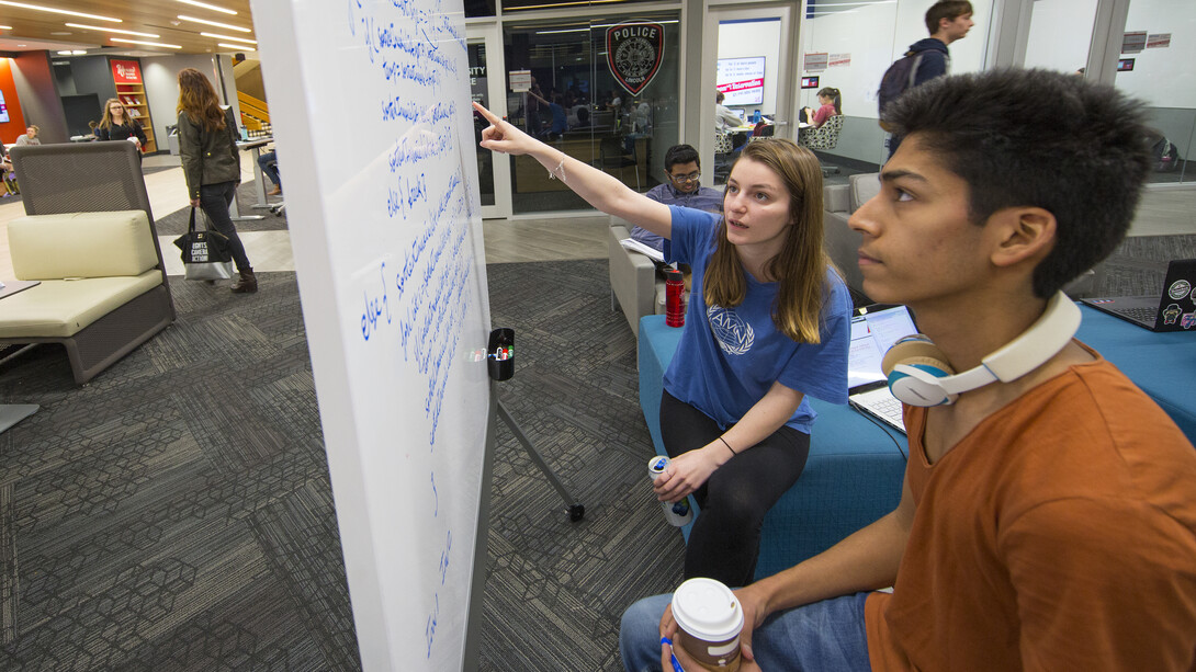 Students Pranav Gupta (right) and Ibra Kurti work on computer science coding in the Adele Hall Learning Commons