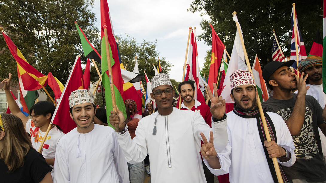 University of Nebraska–Lincoln students from the more than 150 countries marched in the 2016 homecoming parade carrying their country's flags.