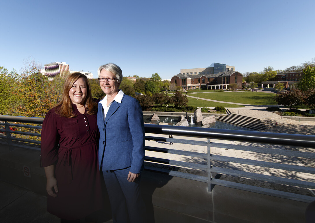 .Ellen Weissinger (right) stands with her niece, Sarah Murphy, director of First-Year Experience and Transition Programs. Weissinger is retiring after more than 40 years of service to the university.