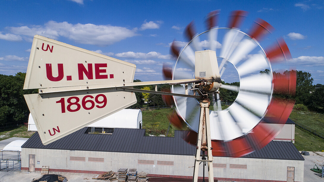 The windmill on East Campus, located behind the Animal Science Building, turns in the wind.