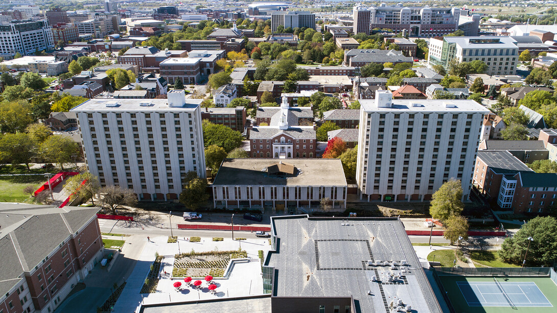 The Cather-Pound-Neihardt dining complex (between the towers) was demolished earlier this semester. The two towers will implode into the space cleared by the removal of the dining center.