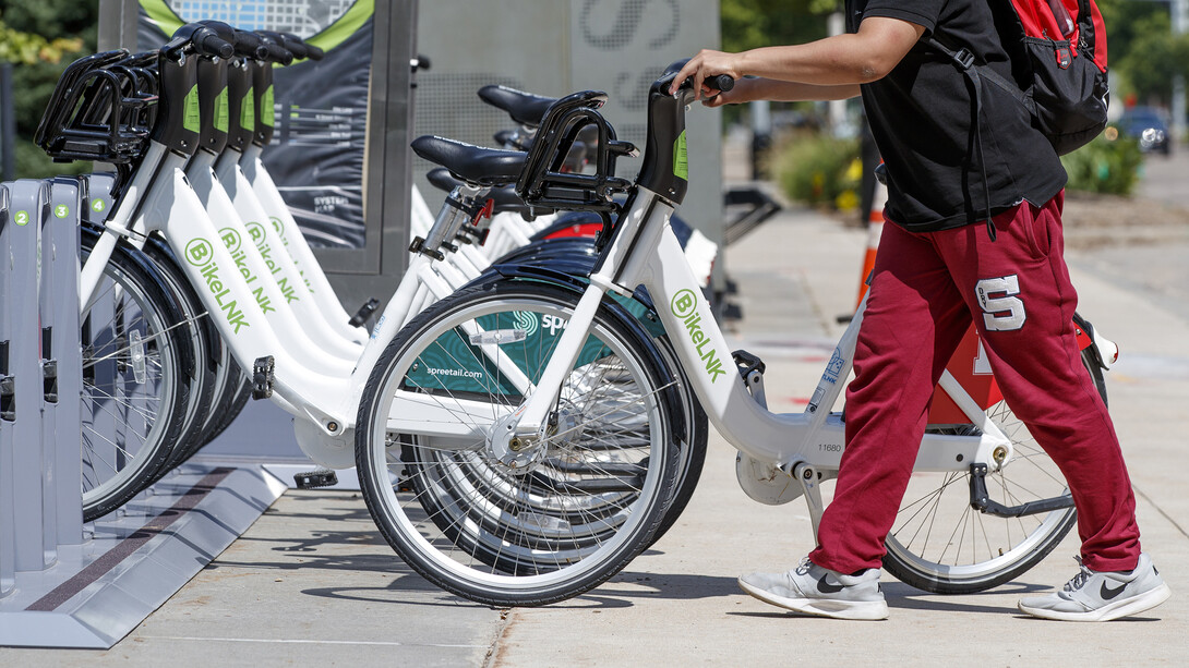 A BikeLNK cruiser is returned to the kiosk on the south side of the Nebraska Union. The service offers seven kiosks at or near University of Nebraska–Lincoln campuses.