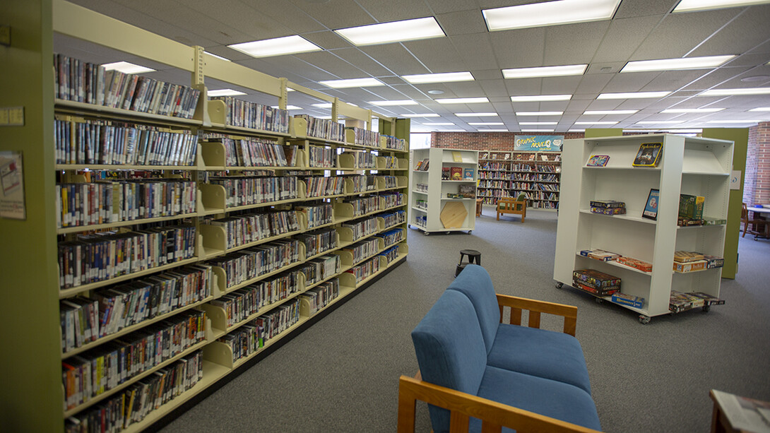 Other popular Media Services items — including movies (left) and board games are available for checkout in the second floor link of Love Library. The area also features the library's graphic novel collection.