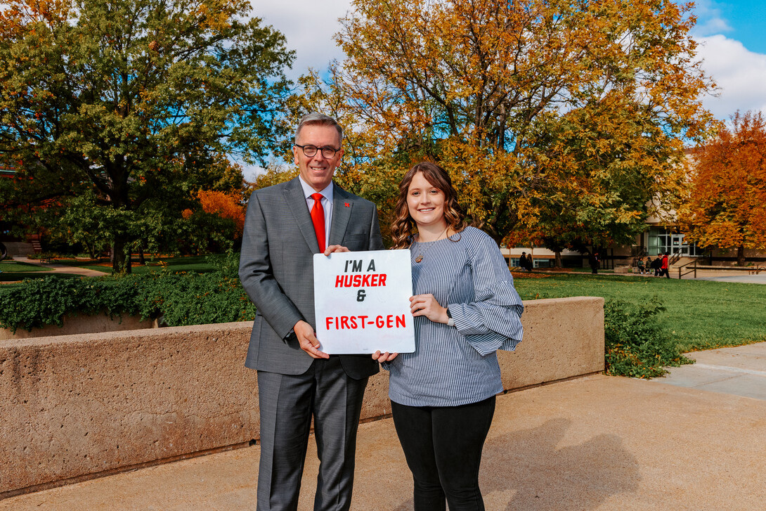 Chancellor Ronnie Green stands with junior Maddie Swanson after their first-gen Q&A.