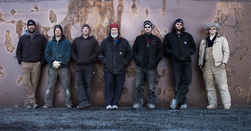 UNL drillers at McMurdo Station last December before their deployment with the history-making WISSARD project. From left: Jeff Lemerey, Daren Blythe, Dar Gibson, Dennis Duling, Chad Carpenter, Graham Roberts and Justin Burnett. All are scheduled to redeploy to the ice this season along with a new crew member, Nathan Bowker. 