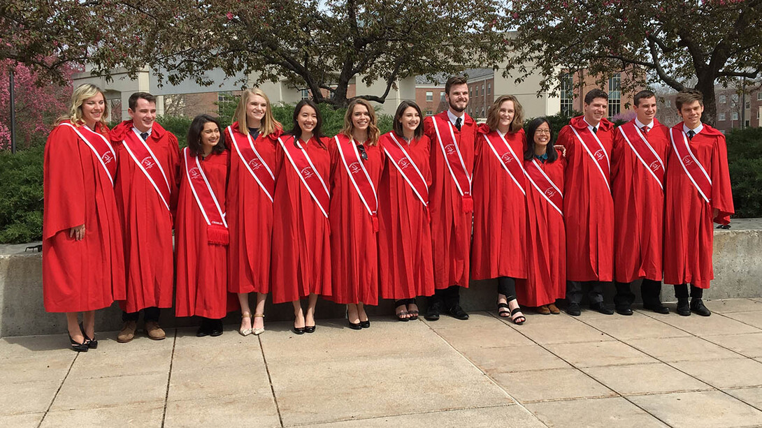 The new Innocents Society members are, from left, Taylor Lofdahl, Sam Brower, Natasha Naseem, Olivia Beier, Marcella Mercer, Shelby Williby, Erin Sheehan, Tanner McKerlie, Kayla Punt, Tiffany Truong, Alan Davis, Kurt Cronican and Alec Williams. 