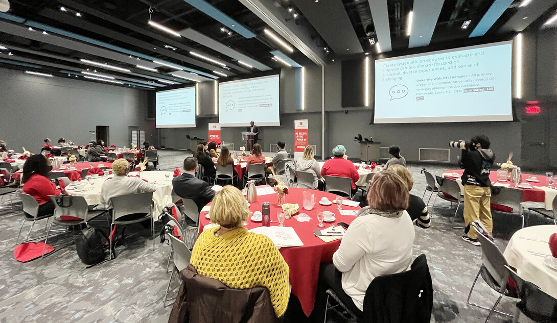 The audience listens while Marco Barker, vice chancellor for diversity and inclusion, presents at the State of Diversity.