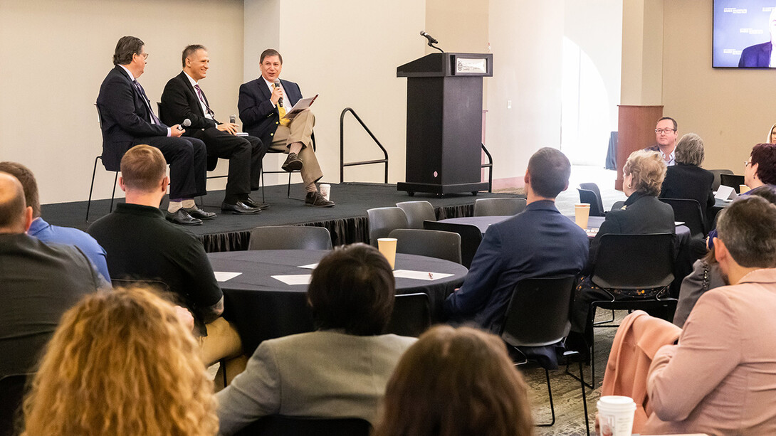 Ken Levinson (right) executive director of the Washington International Trade Association, moderates a panel at the Yeutter Institute symposium at Nebraska Innovation Campus. The panel, discussing North American trade dynamics, included from left, Eric Miller, a specialist in Canadian trade issues, and Kenneth Smith Ramos, who was Mexico’s chief negotiator in creating a revamped NAFTA. David Gantz (not pictured), a trade policy analyst at the Baker Institute at Rice University, spoke on the pa