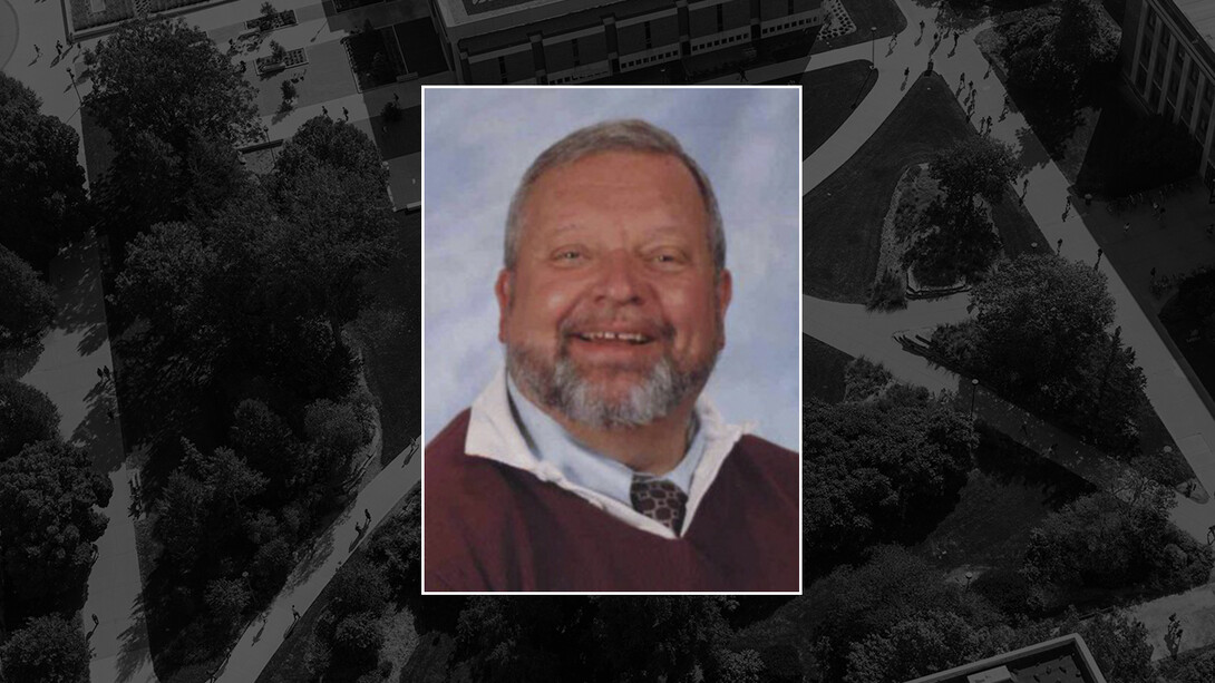 Color photo of James Hejduk on black campus background