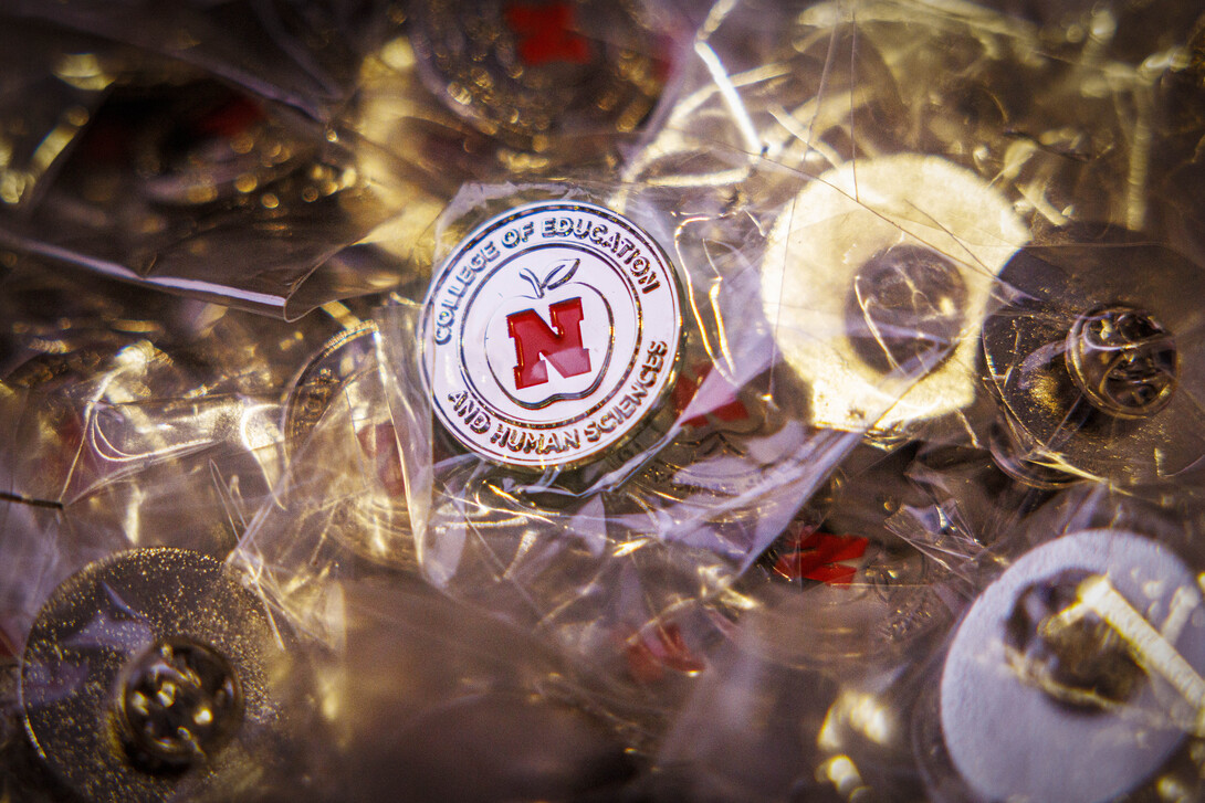 A pile of commemorative pins